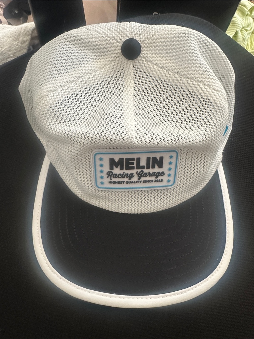 MELIN White Mesh Racing Garage Trucker Hat with Black Visor